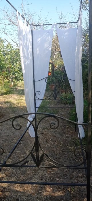 Letto baldacchino artigianale in ferro battuto