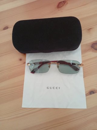 Occhiali da sole Gucci oro e verdi