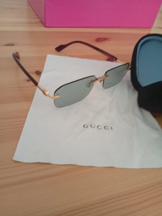 Occhiali da sole Gucci oro e verdi