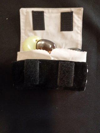 Bolsita con gemas de chakras y colgantes
