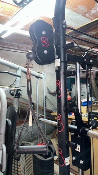 Multipower con discos, barras y pesos