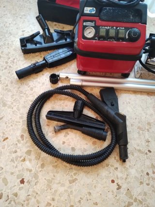 Vaporeta con accesorios, plancha y bolsa