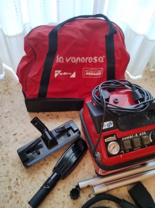 Vaporeta con accesorios, plancha y bolsa