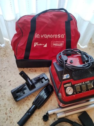 Vaporeta con accesorios, plancha y bolsa