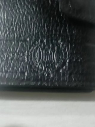 Cartera de piel negra multifuncional