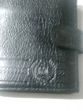 Cartera de piel negra multifuncional