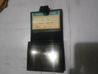 Cartera de piel negra multifuncional