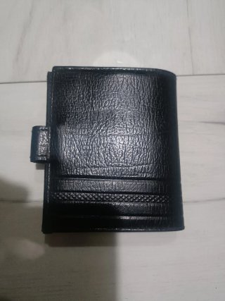 Cartera de piel negra multifuncional