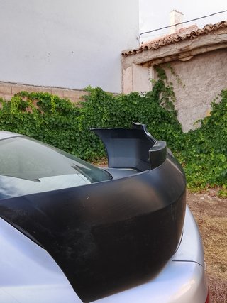 Paragolpes Trasero Nissan Almera N16 Negro