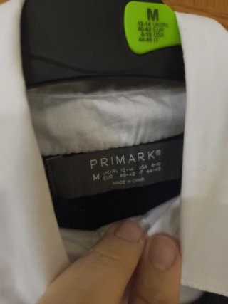 Camisa blanca y chaleco negro Primark Talla M