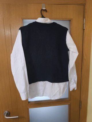 Camisa blanca y chaleco negro Primark Talla M