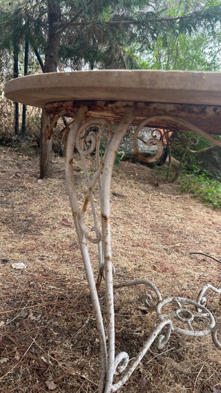 Mesa de jardín redonda para restaurar