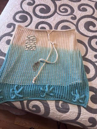 Falda crochet turquesa con estrellas de mar
