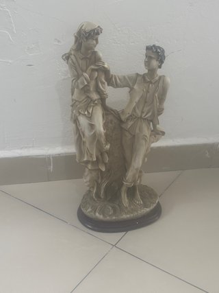 Figura decorativa de pareja