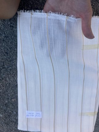 Tela de lino beige con bordado