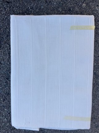 Tela de lino beige con bordado