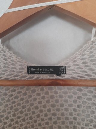 Chaqueta larga beige de punto
