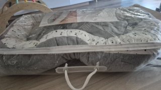 Cuna nido bebé con estampado de león
