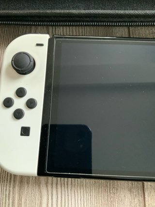 Nintendo Switch OLED + 27 juegos