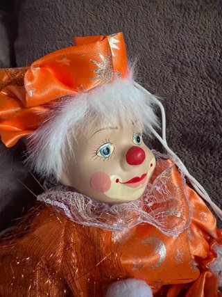 Figura payaso cerámica en columpio