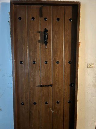 Puerta de entrada metal imitación madera rústica