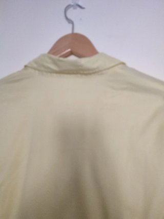 Blusa amarilla manga 3/4 con pinzas