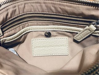 Bolso piel Adolfo Dominguez gris.