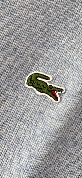 Polo Lacoste Azul claro jaspeado talla 5=L