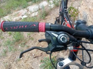 Bicicleta Montaña Orbea Negra y Roja