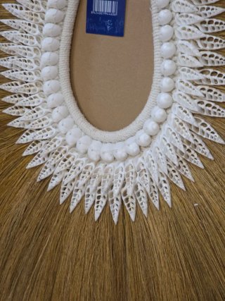 Adorno pared collar tribal conchas