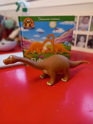Libro infantil dinosaurio con juguete