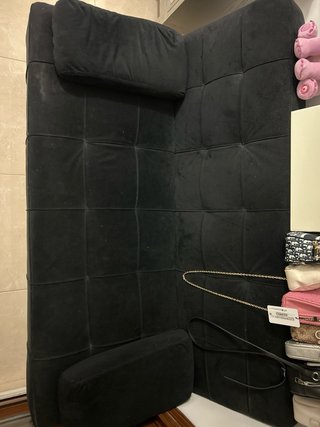 Sofá cama negro de terciopelo