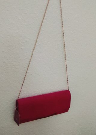 Bolso fiesta fucsia con cadena