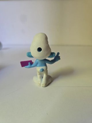 Statuetta Vintage Puffo Quattrocchi con Libro