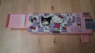 Estuche Hello Kitty y Kuromi con calculadora
