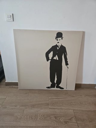 Cuadro de Chaplin en lienzo beige y negro