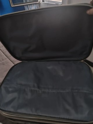 Maleta de viaje gris