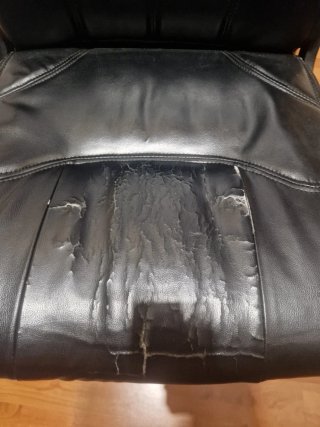 REGALO Silla de oficina polipiel negra con ruedas