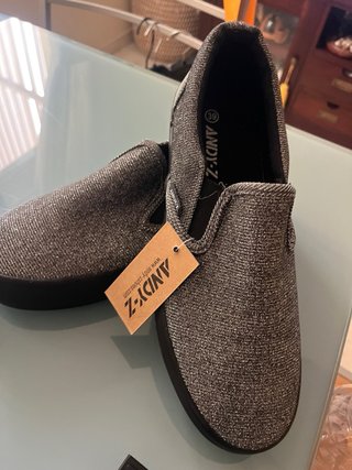Zapatos planos naranjas con pedrería