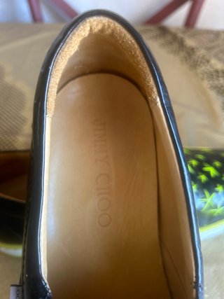 Zapatos negros con estrellas verdes
