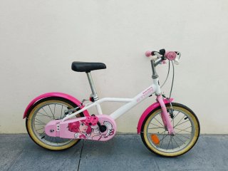 Bicicleta infantil B'Twin rosa y blanca