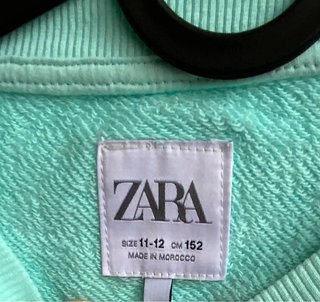 Sudadera azul con flores sin estrenar