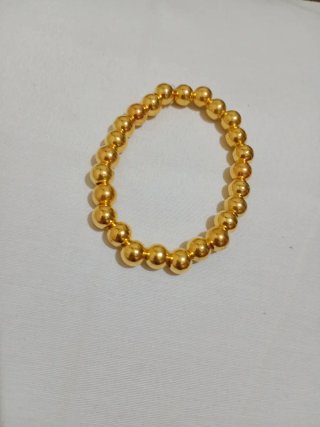 Pulsera elástica dorada