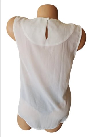 Blusa blanca fluida sin mangas Talla S