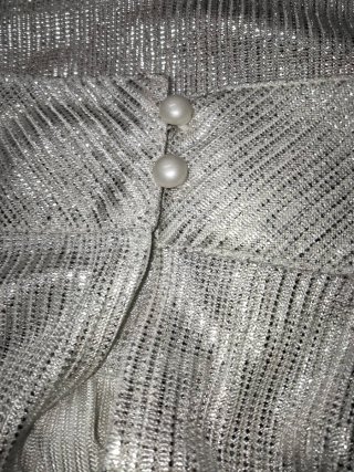 Blusa brillante plateada nueva