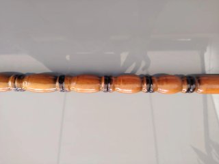Bastón de madera tallada con acero inoxidable