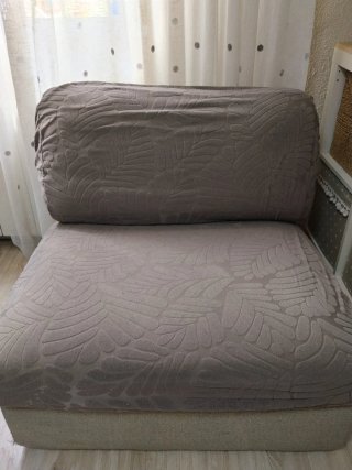 Sofá individual gris