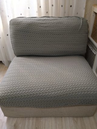 Sofá individual gris