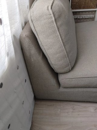Sofá individual gris