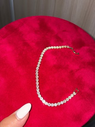Bracciale color oro con brillantini